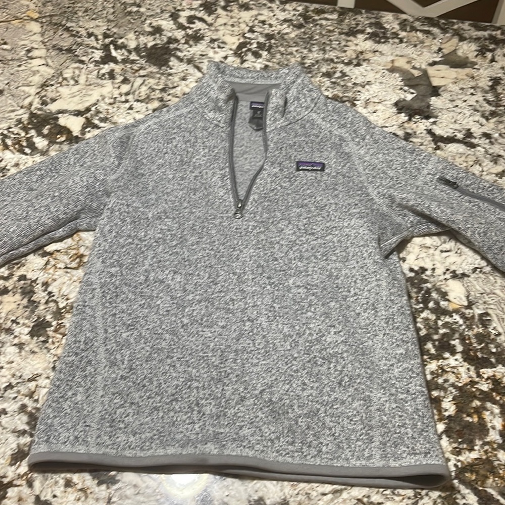 Patagonia 1/4 zipper kids size Medium. New with no tag.